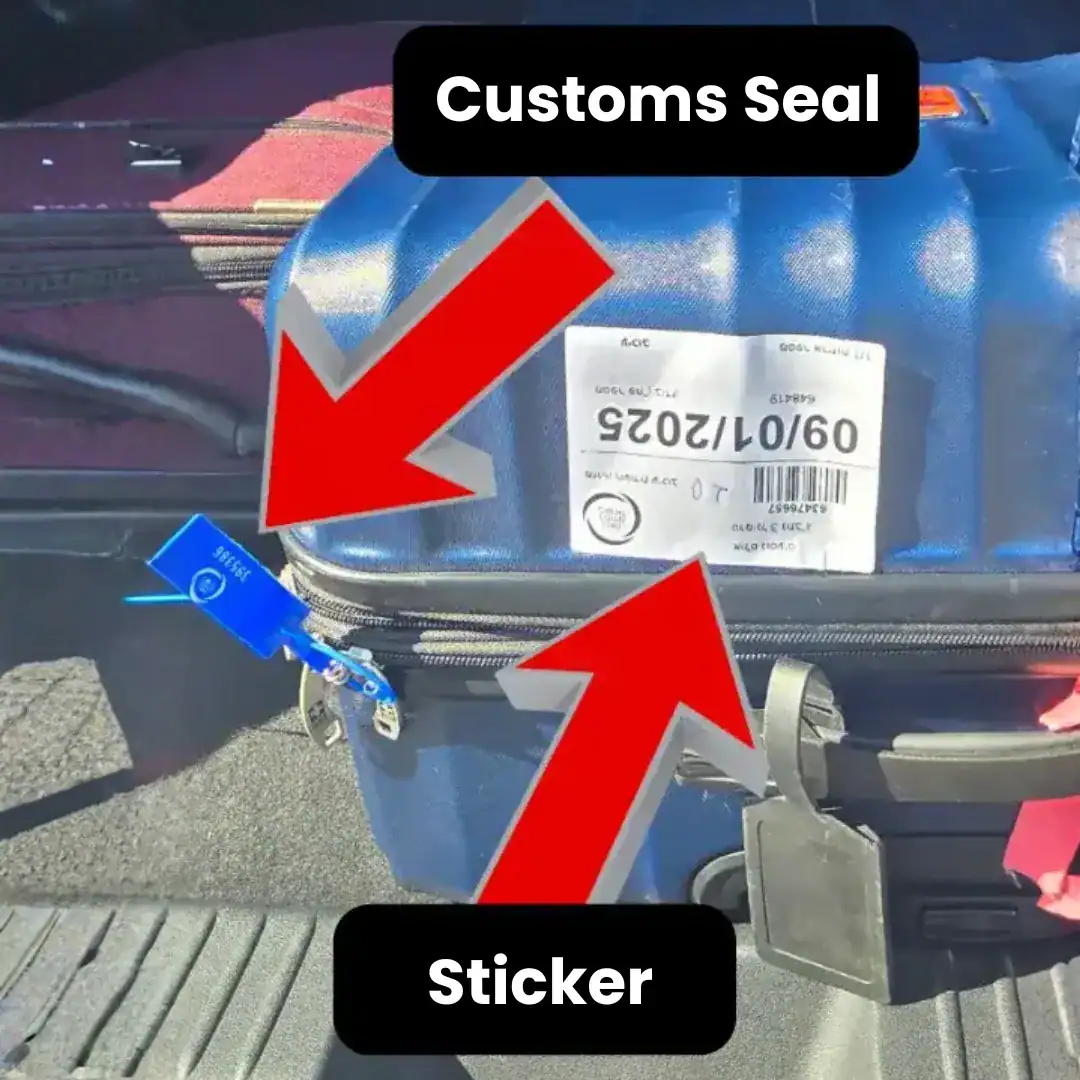 Luggage with custom seal and sticker.